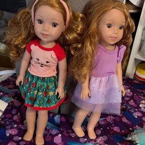 American Girl Dolls in Red and Purple Outfits